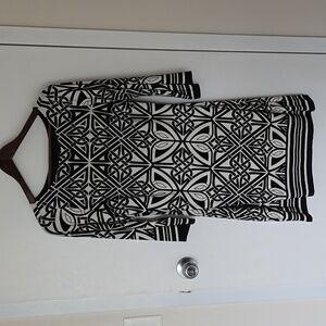 Geometric black and white dress. Mid length sleeves.